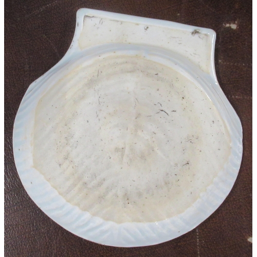 310 - An Oriental scallop shaped dish, width 7ins