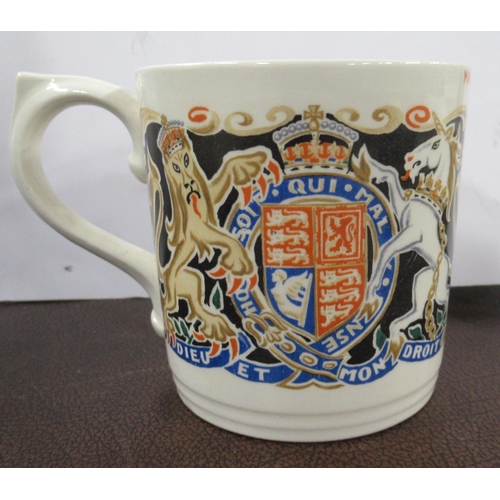 313 - A Royal commemorative mug, designed by Dame Laura Knight