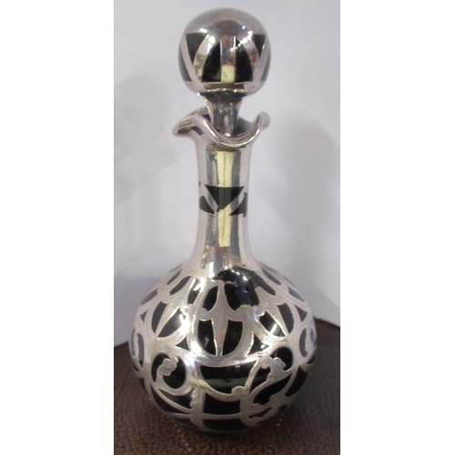 315 - A silver overlaid glass scent bottle, height 6ins