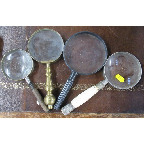 319 - Four magnifying glasses