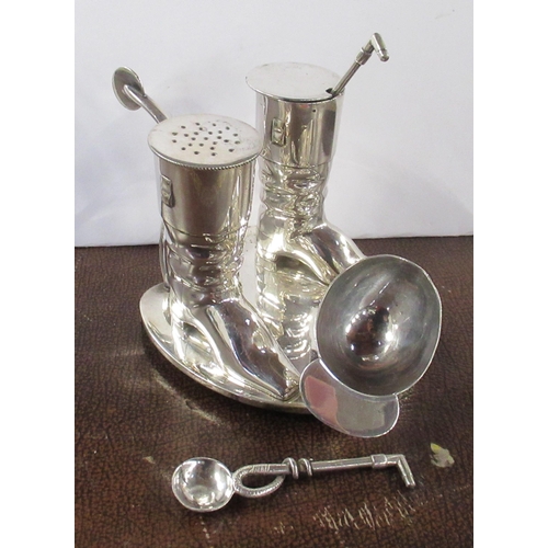 327 - A Victorian silver plated cruet, formed as two hunting boots