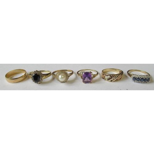 337 - Five gold gem set rings, marked 9K or 375, weight 16.8g, together with a wedding band, marked .375, ... 