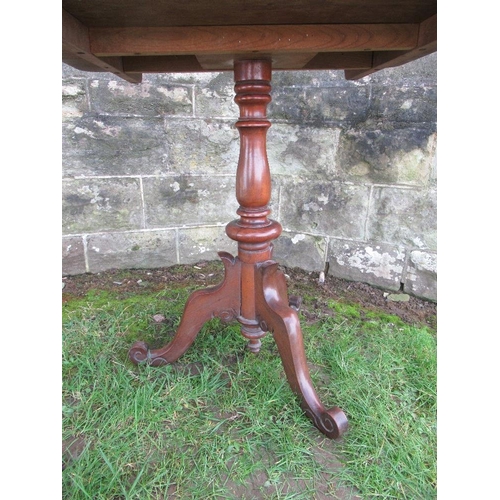 39 - A 19th century rectangular topped mahogany tripod table, 32ins x 25ins, height 27ins