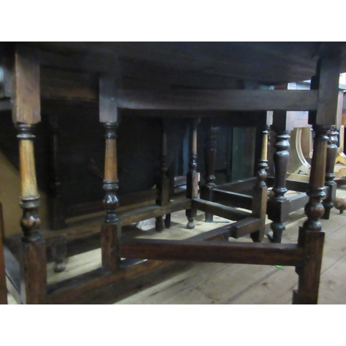 46 - An oak gate leg table, width 43ins