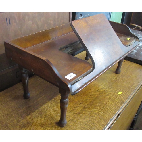 47 - A mahogany folding bed table, width 25ins