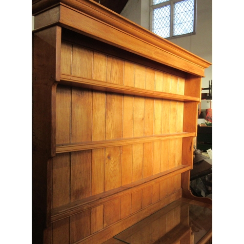 51 - An oak dresser, with plate rack, width 62ins, height 82ins