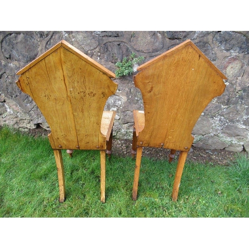 6 - A pair of 19th century oak hall chairs, with shield to the carved solid back, solid seat, on inlaid ... 