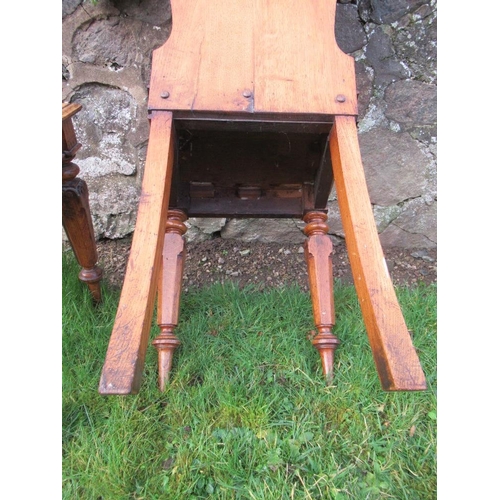 6 - A pair of 19th century oak hall chairs, with shield to the carved solid back, solid seat, on inlaid ... 