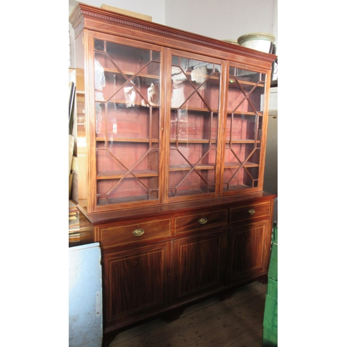 74 - A 19th century mahogany and satinwood inlaid glazed cabinet, the upper section with three astragal g... 