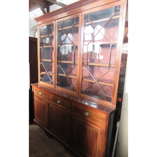 74 - A 19th century mahogany and satinwood inlaid glazed cabinet, the upper section with three astragal g... 