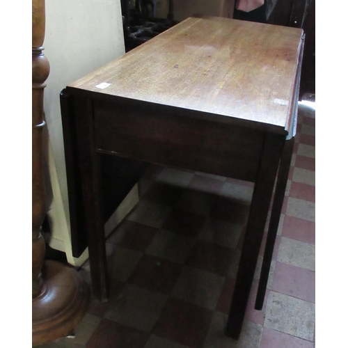 76 - A 19th century mahogany drop leaf table