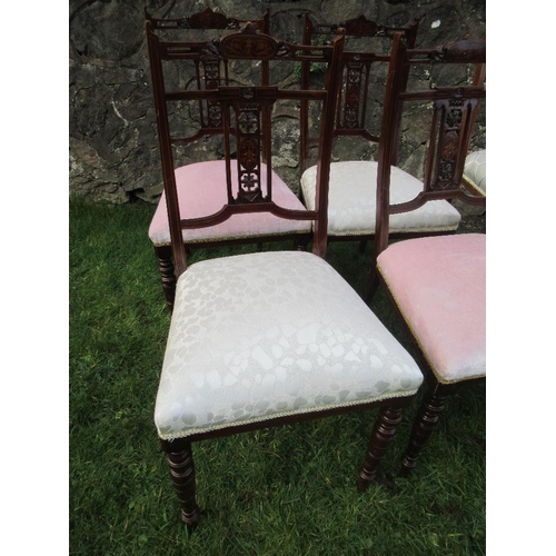 9 - A set of four Edwardian chairs with a pair of bar back Edwardian Chairs