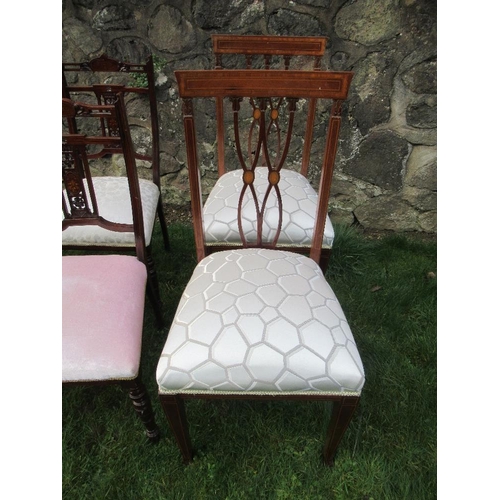 9 - A set of four Edwardian chairs with a pair of bar back Edwardian Chairs