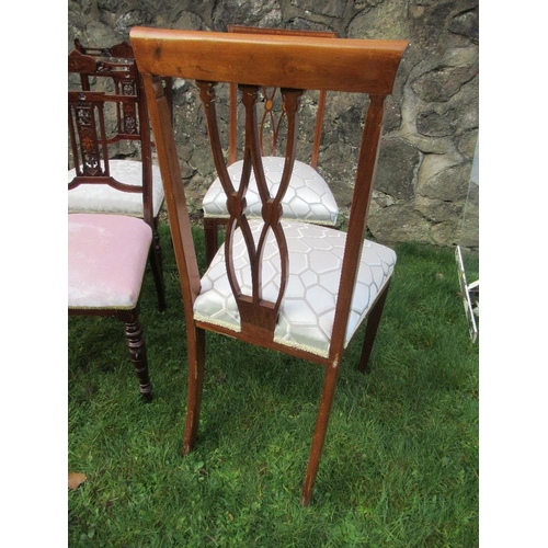 9 - A set of four Edwardian chairs with a pair of bar back Edwardian Chairs