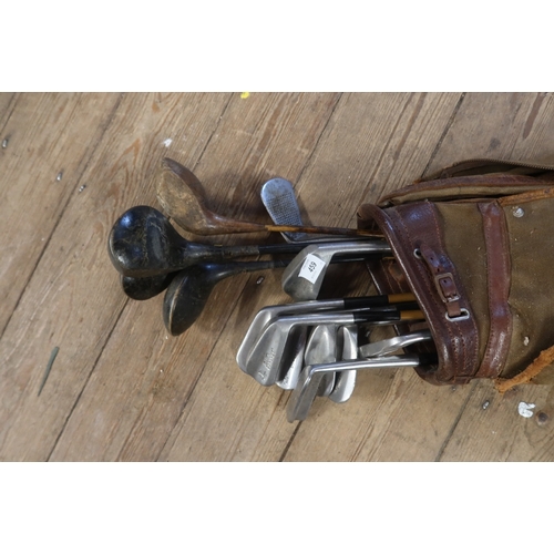 459 - A collection of vintage golf clubs