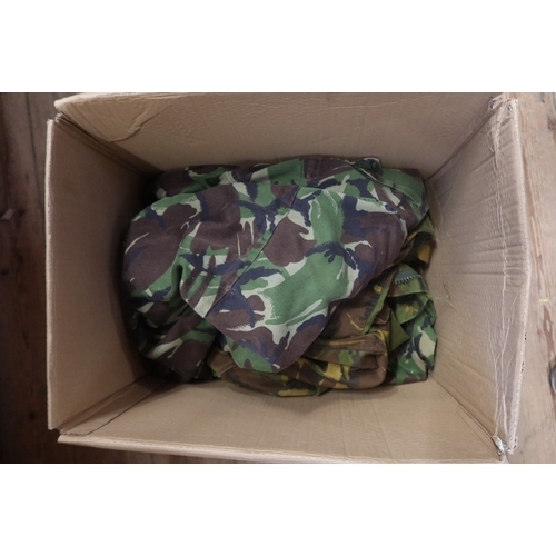 458 - A box of military uniforms and fatigues