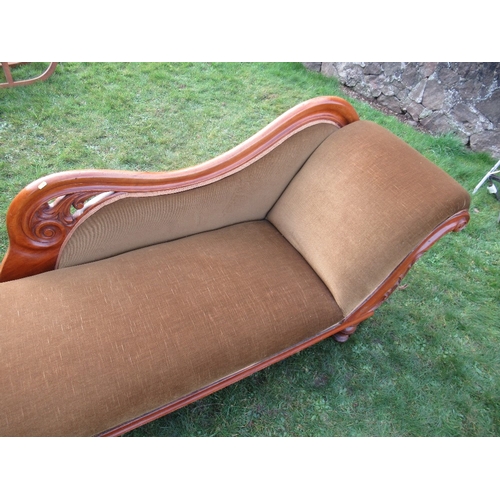 74B - A Victorian chaise longue, with green upholstery