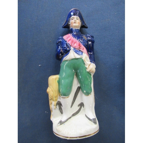 238 - Two Staffordshire figures, Nelson and a naval officer, height 7ins