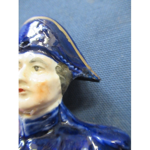 238 - Two Staffordshire figures, Nelson and a naval officer, height 7ins