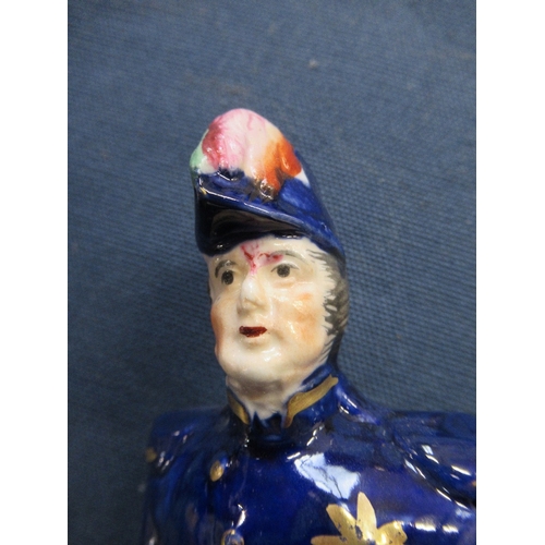 238 - Two Staffordshire figures, Nelson and a naval officer, height 7ins