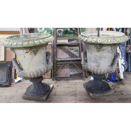 11 - A pair of Classical style campana shaped garden urns, height 28ins stamped Doulton Lambeth