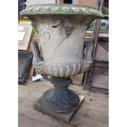 11 - A pair of Classical style campana shaped garden urns, height 28ins stamped Doulton Lambeth