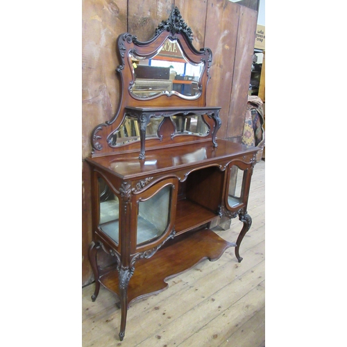 15 - An Edwardian mahogany mirror back cabinet, fitted with a shelf, over glazed cupboards and shelves, w... 