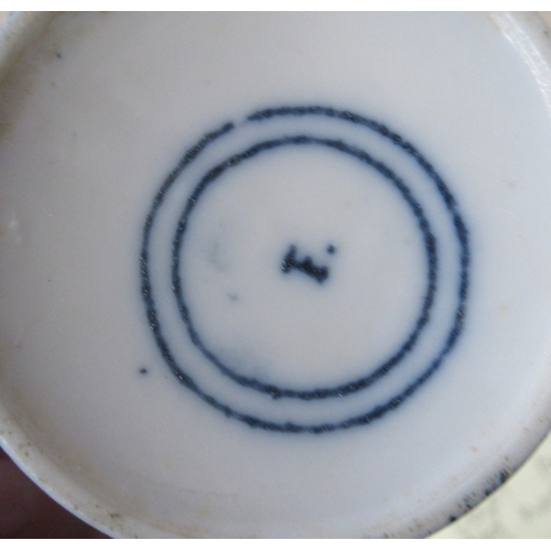 155 - A pair of blue and white onion pattern trio's, together with four coffee cans and two saucers