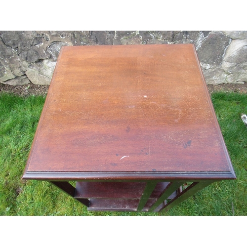 16 - A mahogany revolving book stand 19