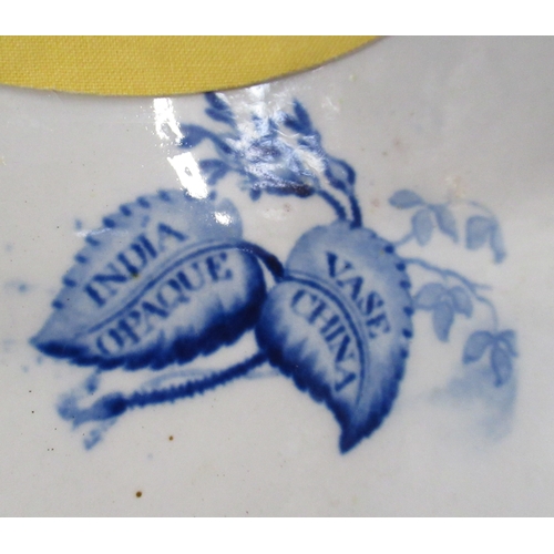 172 - A 19th century blue and white meat platter, marked India Vase Opaque China, together with another me... 