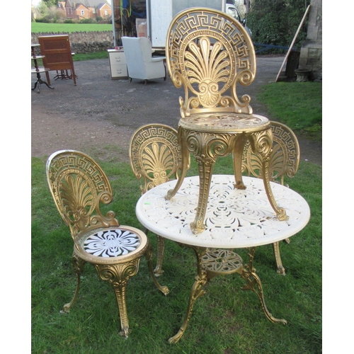 25 - A painted metal circular garden table, diameter 32ins, together with a set of four chairs