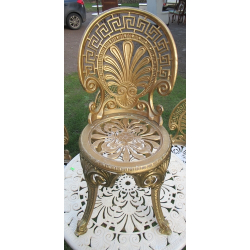 25 - A painted metal circular garden table, diameter 32ins, together with a set of four chairs