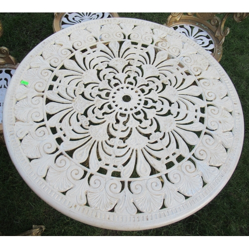 25 - A painted metal circular garden table, diameter 32ins, together with a set of four chairs