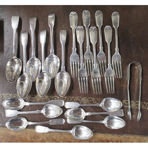 A collection of silver fiddle pattern flatware, all engraved with an ...
