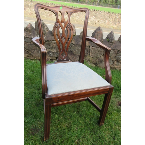 27 - A set of 12 (10+2) mahogany dining chairs, with pierced vase splat backs and drop in seats