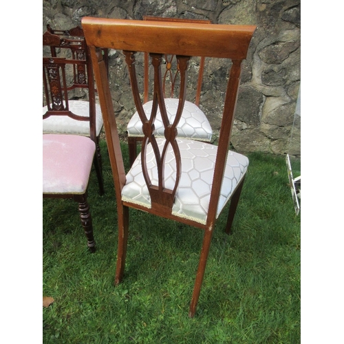 29 - A set of four Edwardian chairs with a pair of bar back Edwardian Chairs