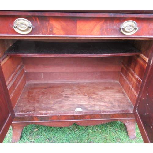 32 - A 19th century mahogany cabinet, fitted with a frieze drawer over a pair of cupboard doors, 36ins x ... 