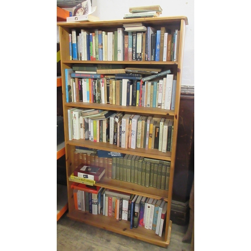 368 - A modern pine bookcase, 66ins x 36ins, depth 10ins, together with a quantity of books