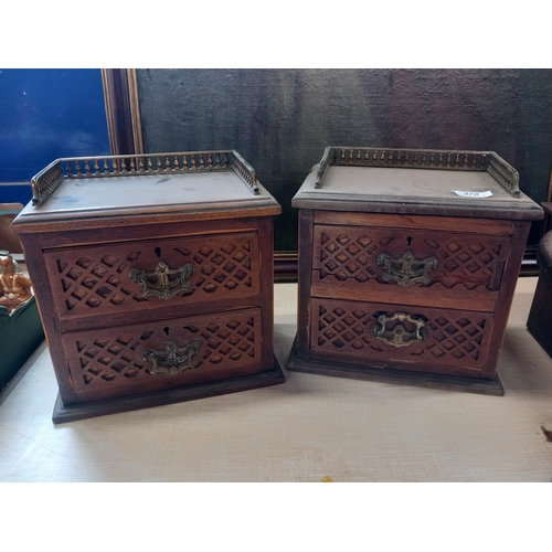 378 - A pair of galleried table top cabinets