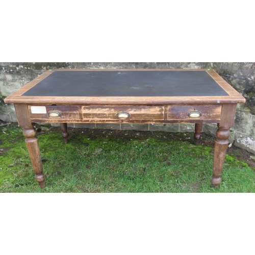 38 - An oak desk, with inset writing surface and fitted with frieze drawers, 36ins x 60ins, height 30.5in... 