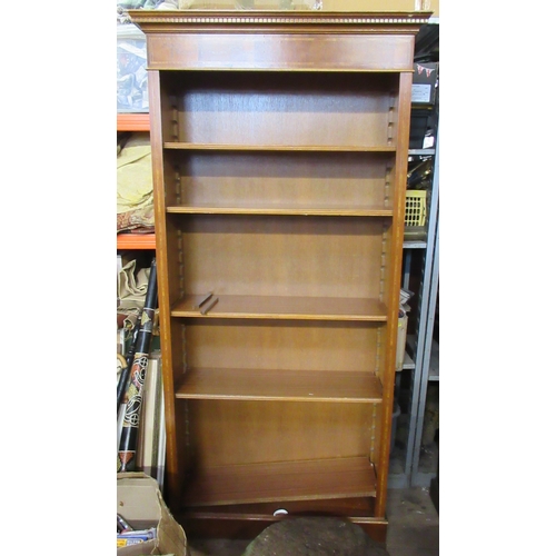 4 - A bookcase, with swag decoration, height 81.5ins, width 40ins, depth 12ins