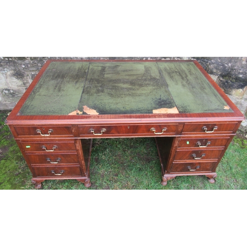 46 - A mahogany pedestal desk, with leather writing surface, fitted with an arrangement of nine drawers r... 