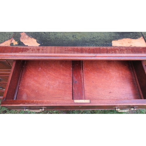 46 - A mahogany pedestal desk, with leather writing surface, fitted with an arrangement of nine drawers r... 