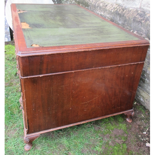 46 - A mahogany pedestal desk, with leather writing surface, fitted with an arrangement of nine drawers r... 