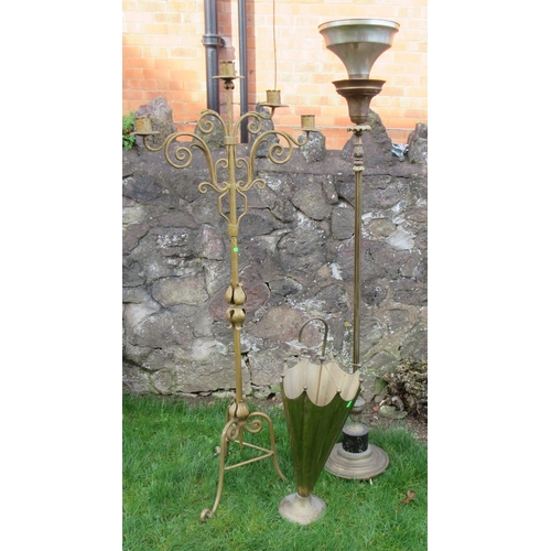 47 - A floor standing candle stand, height 58ins, together with a brass umbrella shaped umbrella stand an... 