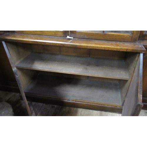 5 - A 19th century oak breakfront bookcase, with glazed doors to the upper section and cupboard doors to... 