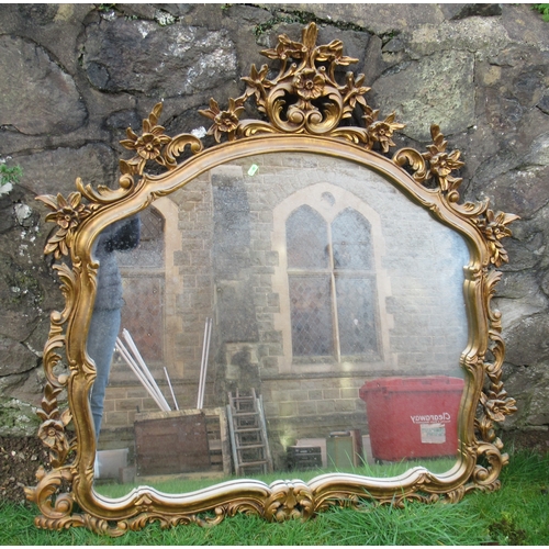 50 - A gilt framed wall mirror, overall 46ins x 44ins