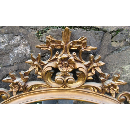 50 - A gilt framed wall mirror, overall 46ins x 44ins