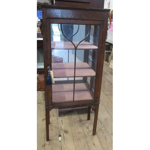 54 - An Edwardian oak display cabinet, height 51ins, width 22.5ins