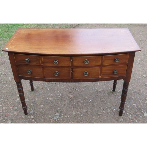 55 - A 19th century mahogany bow front sidetable, with satinwood line inlay, fitted with two drawers, on ... 